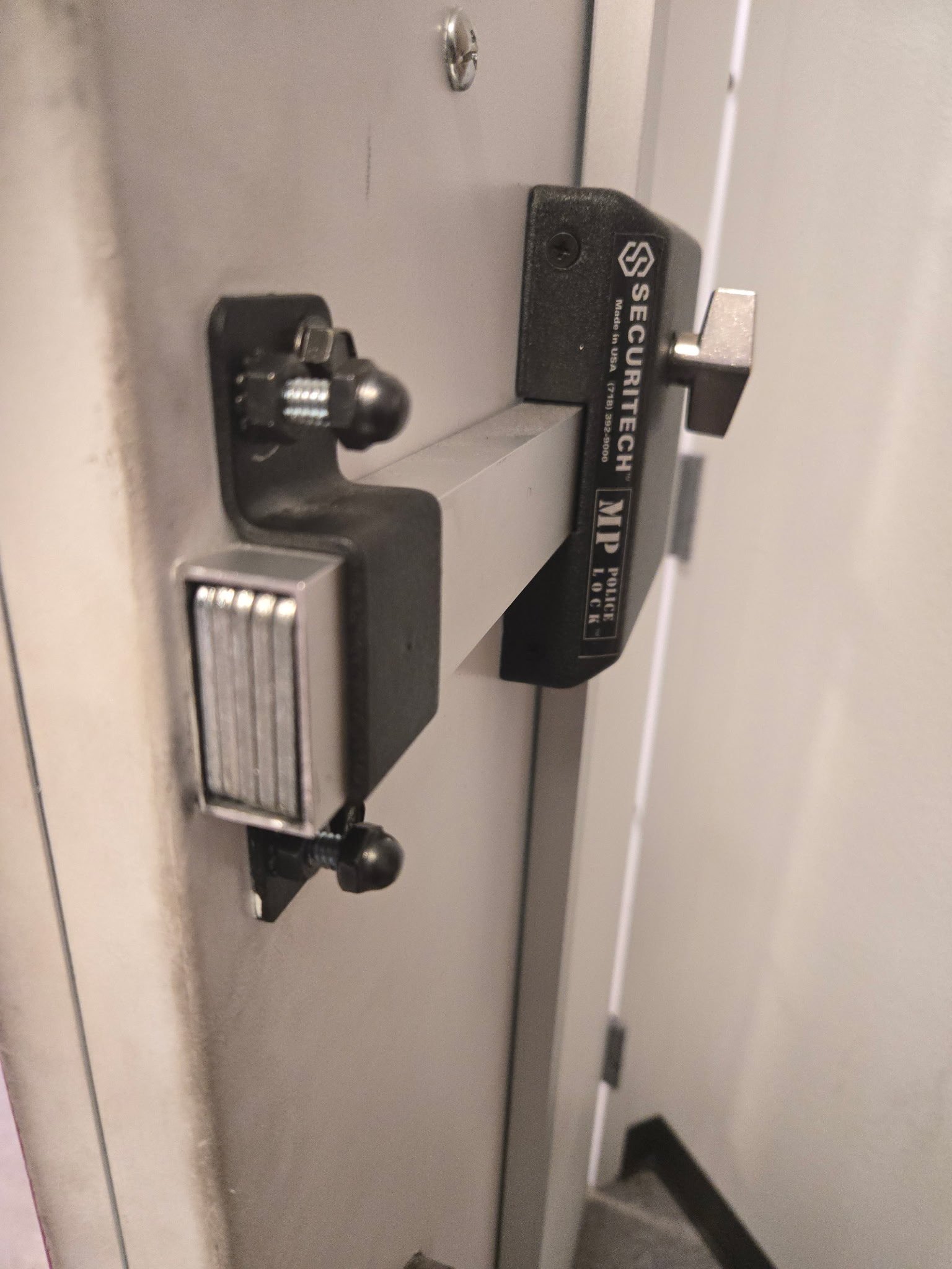 Commercial lock installed on a business door in Albuquerque