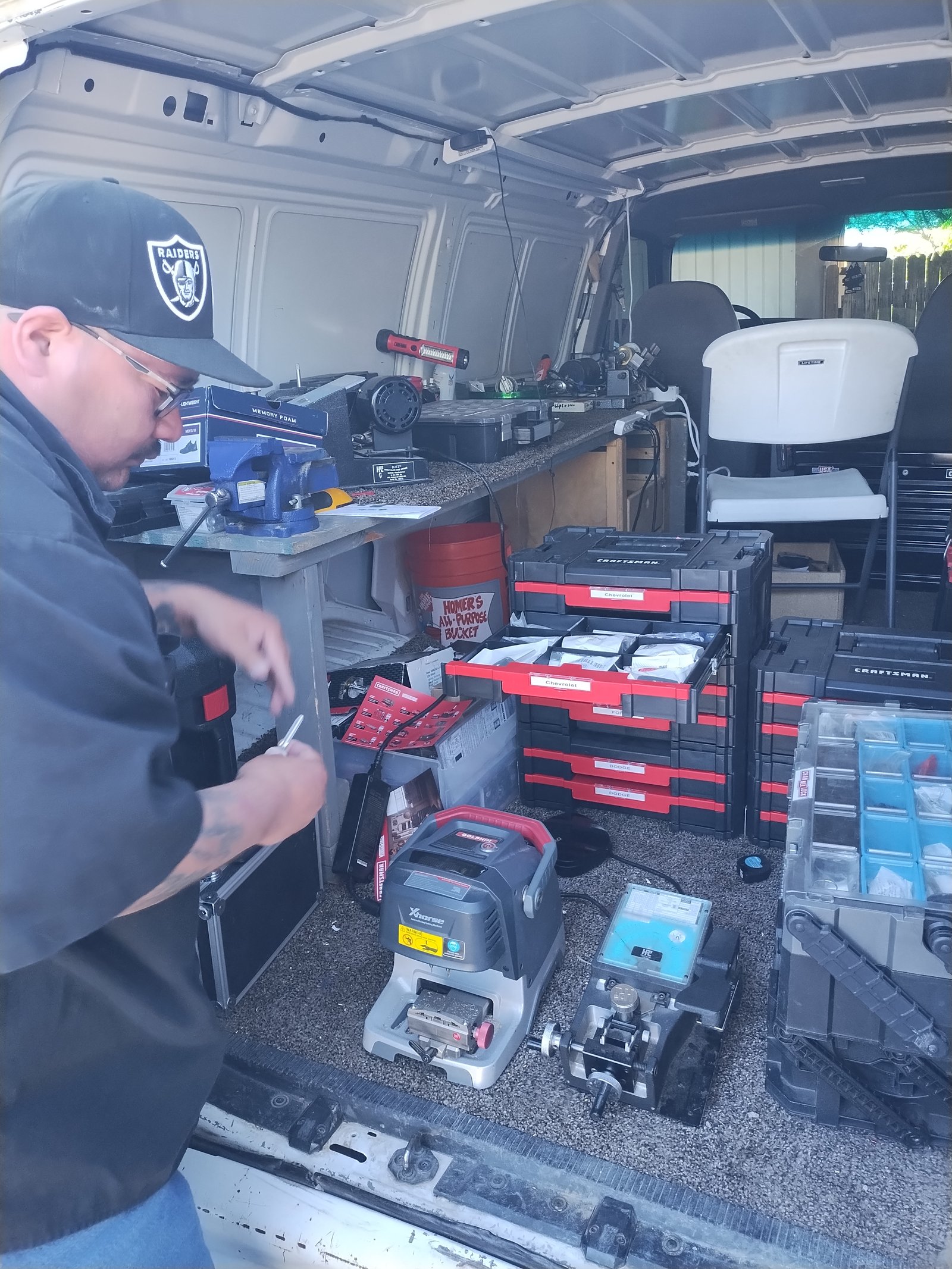 In-van key cutting setup for mobile locksmith service